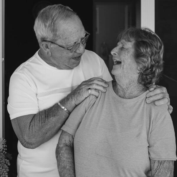 happy man and his wife sharing the great progress made from the a touchy subject membership